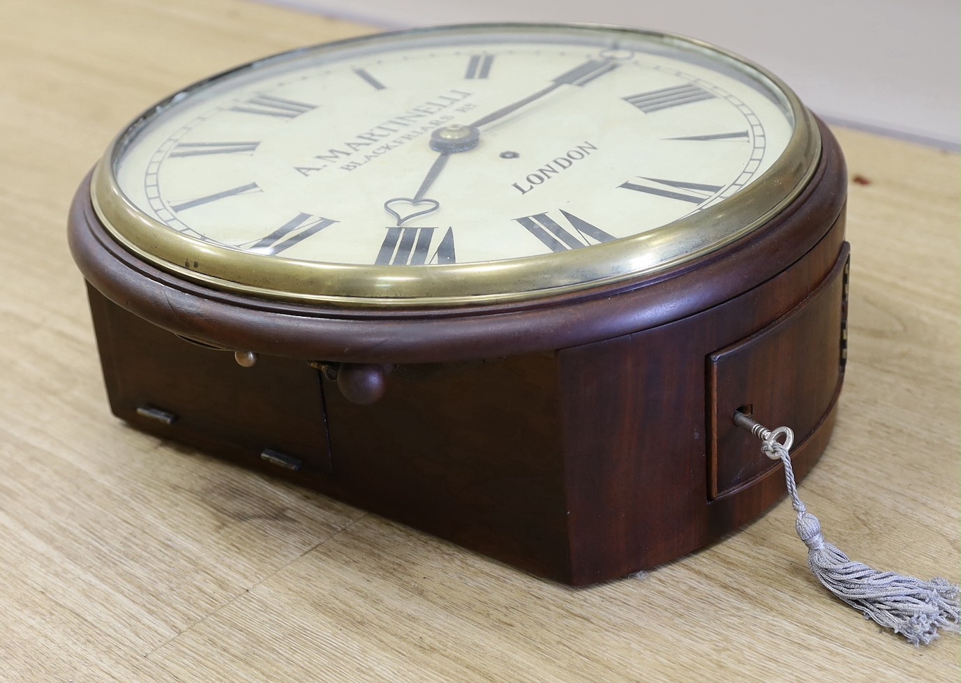 A 19th-century mahogany wall timepiece signed Martinelli, Blackfriars